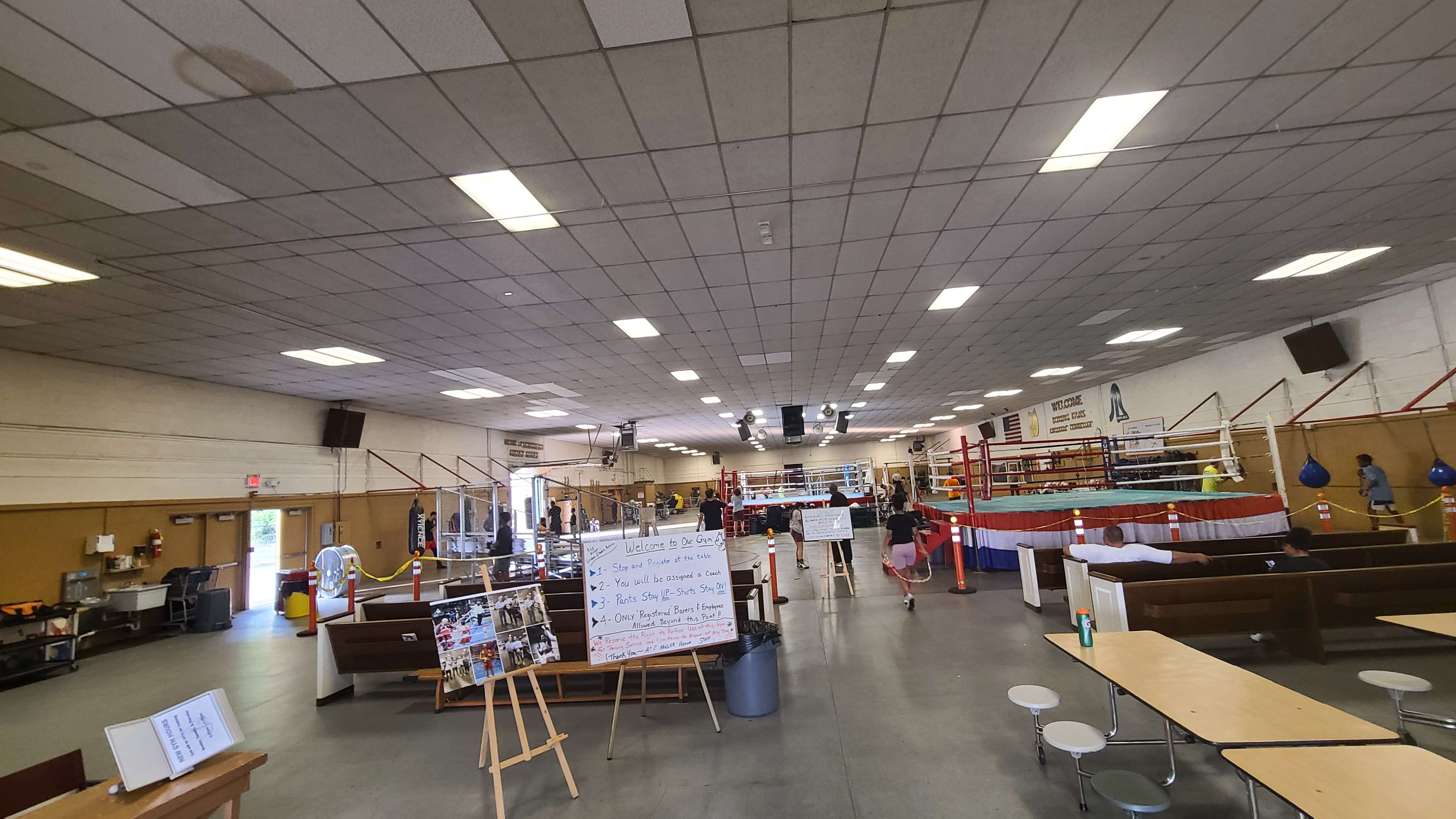 Shot from the entrance of the gym facing the main ring.